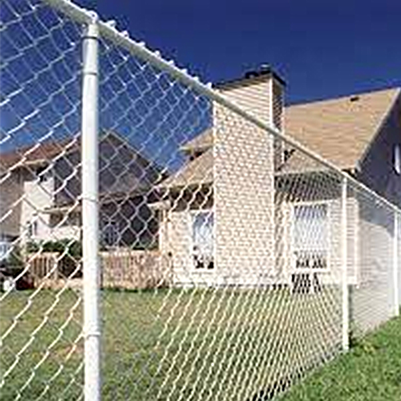 White vinyl coated chain link fence for residential gardens