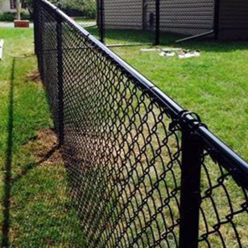 Black vinyl coated chain link fence used for public infrastructure